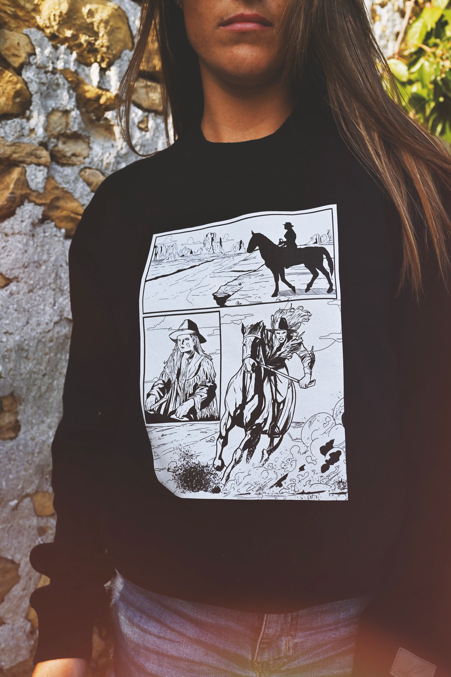 bkack sweartshirt with comic book print of worrior on horseback in the wild