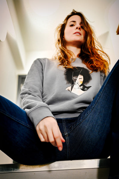 organic cotton and recycled polyester sweatshirt featuring a hand-drawn illustration of the face of a female warrior