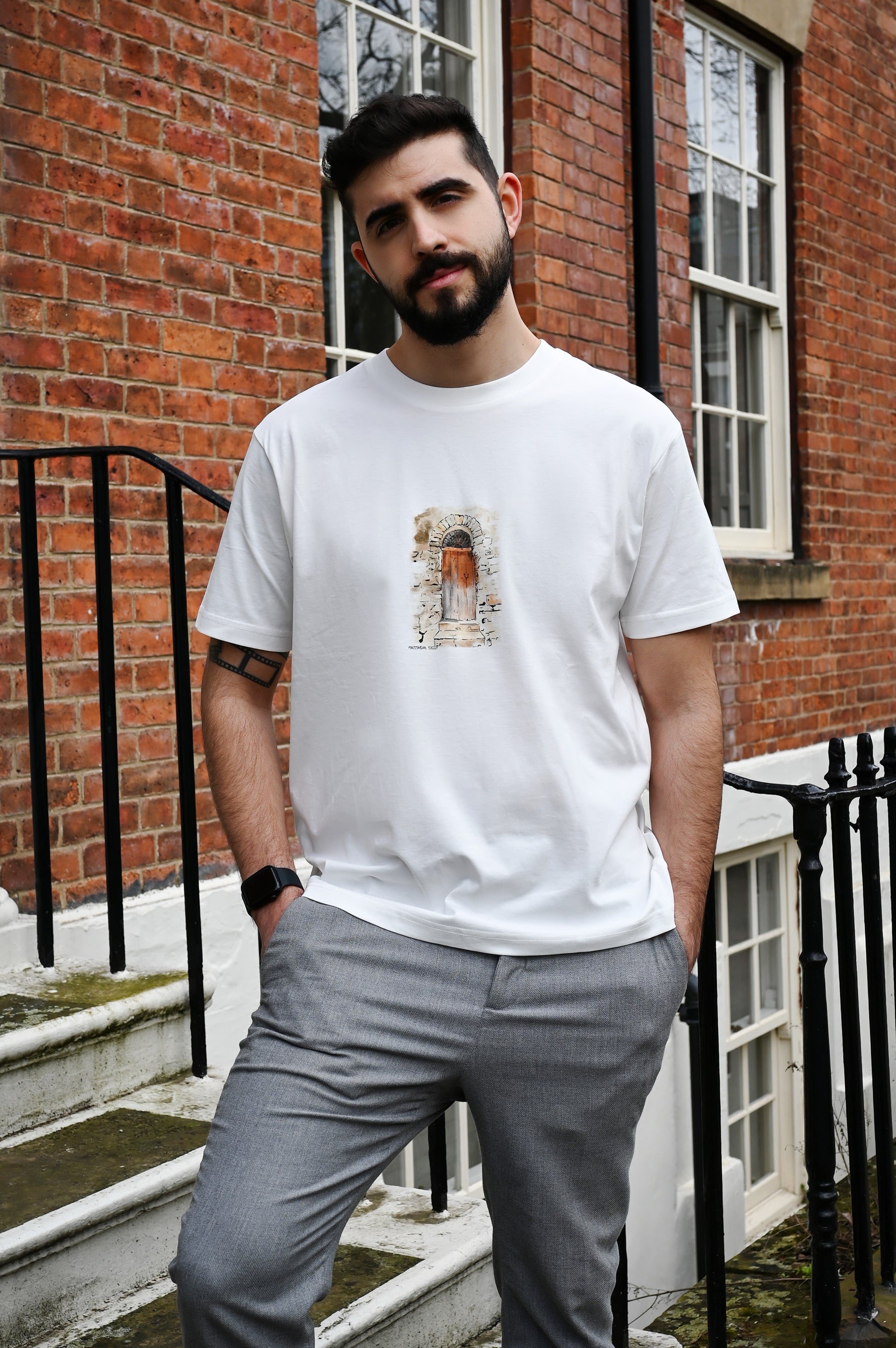 T-Shirt made from high-quality organic cotton, this unique hand-drawn illustration captures the essence of a 100-year-old door in a Sicilian village