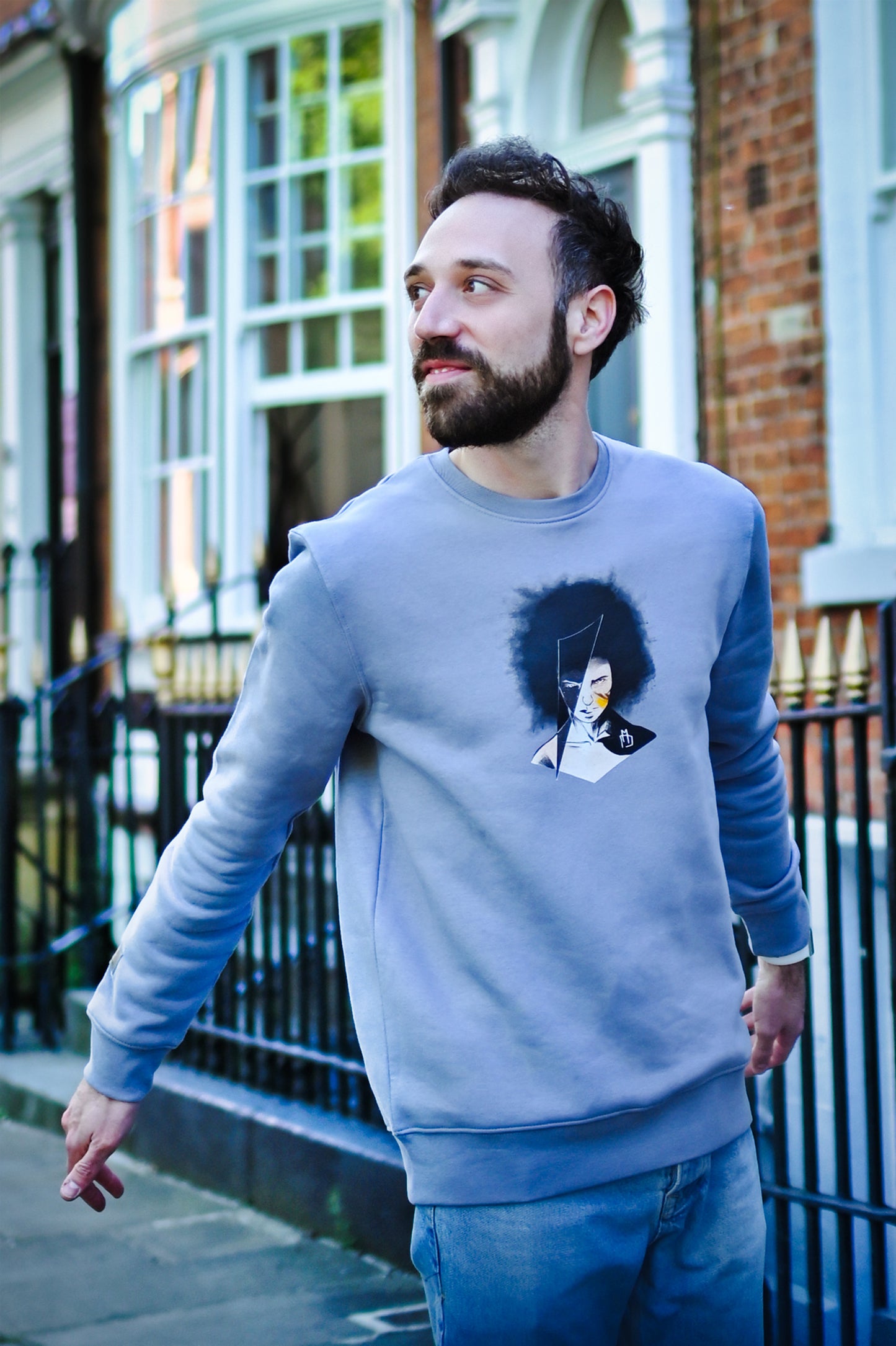 organic cotton and recycled polyester sweatshirt featuring a hand-drawn illustration of the face of a female warrior