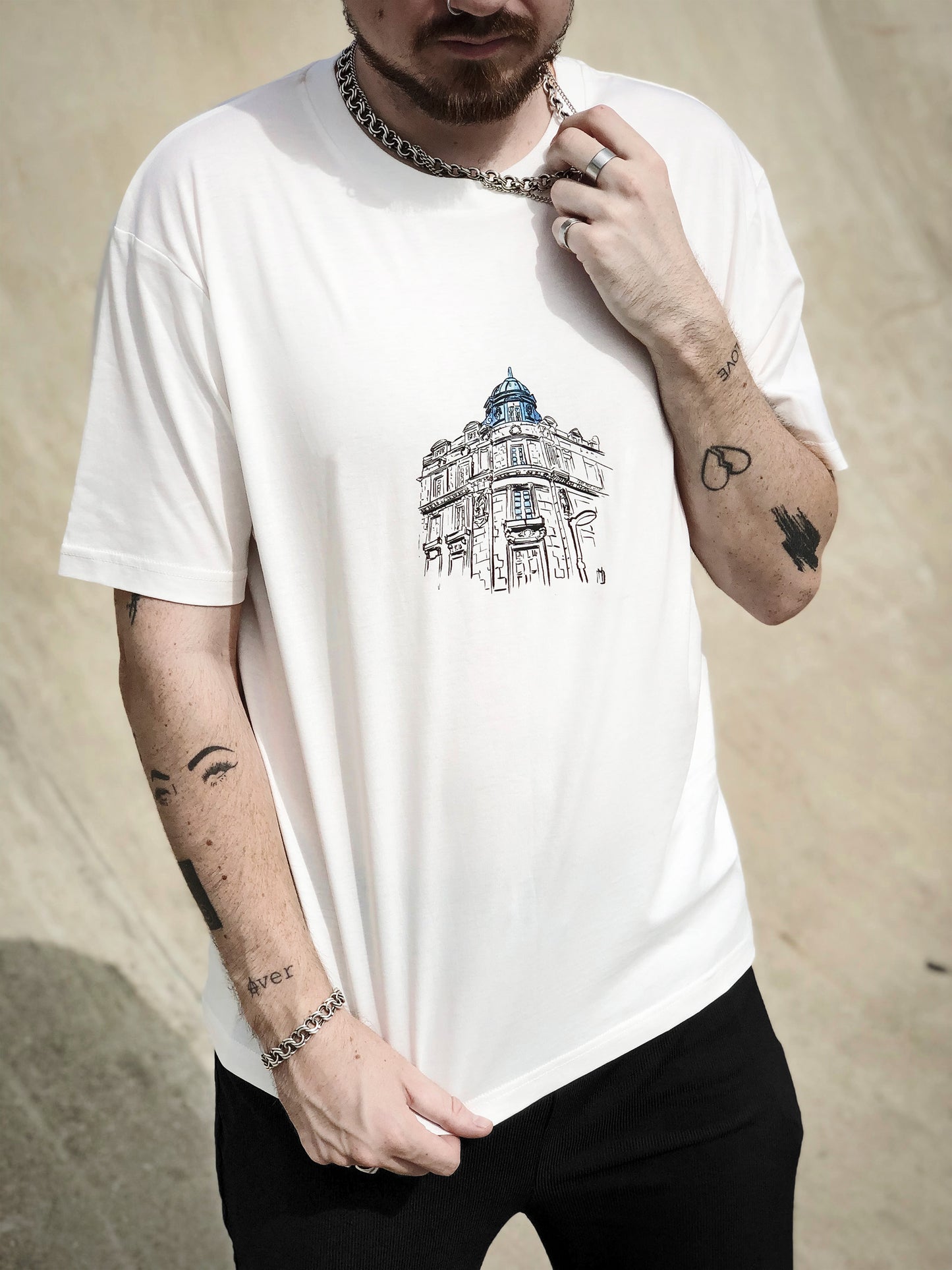 off white T-shirt with hand-drawn Leeds cityscape made from real original photography